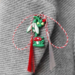 Martisoare. Snowdrops. Baba Marta. Martenitsa. Martisor. Spring amulet. Moldova. Romanian martisor. Märzchen. Martakia. Martis. Romania.
