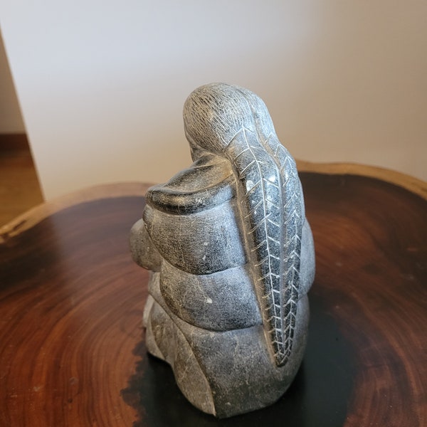 Vintage inuit carving woman in braids