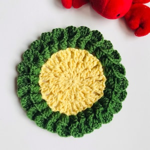 yellow crochet coaster / cozzy