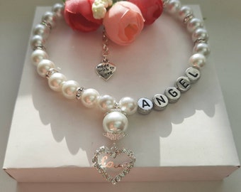 Personalized white pearl necklace for dogs and cats with a heart charm