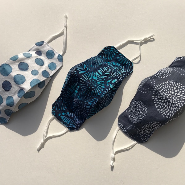 Blues for spring. origami anti fog face masks. Colorful batik w/cotton, fitted, adjustable ear loops, nose wire, 5 sizes, handmade in USA