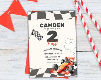 May include: A birthday invitation for a boy turning two years old. The invitation features a checkered flag, a red race car, and the text "CAMDEN is growing up 2 Fast". The invitation also includes the date, time, and location of the party.