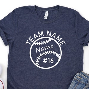 May include: A navy blue t-shirt with a white baseball graphic that says "TEAM NAME Name #16".