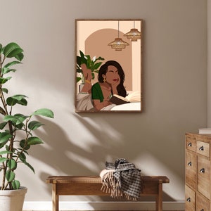May include: A digital illustration of a woman reading a book in bed. The woman is wearing a green and gold sari and has her hair pulled back. The bed is white and there are two wicker pendant lights hanging above the bed.