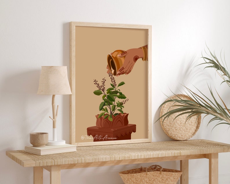 May include: A digital illustration of a hand pouring water from a golden pitcher onto a potted Tulsi plant. The plant is in a terracotta pot with a decorative base. The background is a light brown color. The text "The Art Avenue" is at the bottom of the image.