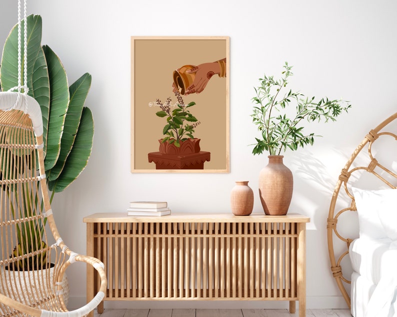 May include: A framed illustration of a hand pouring water on a potted tulsi plant. The plant is in a terracotta pot on a brown pedestal. The background is a light brown color.