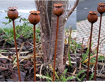 A Set of 5 Rusty Poppy Seed Head Pattern Plant Supports