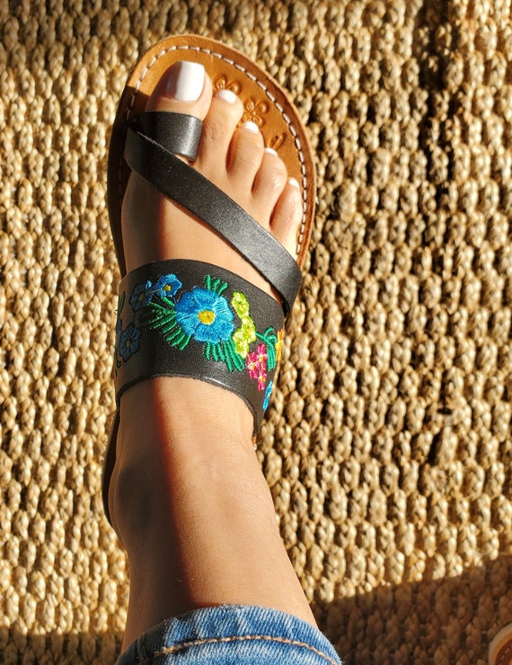 Black and floral huaraches hotsell
