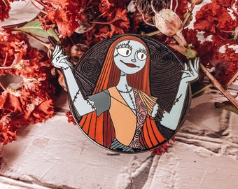 Nightmare Before Christmas Sally sews herself back together enamel pin