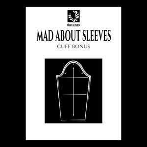 May include: A black and white illustration of a sleeve pattern with the text "MAD ABOUT SLEEVES" and "CUFF BONUS" on a white background.