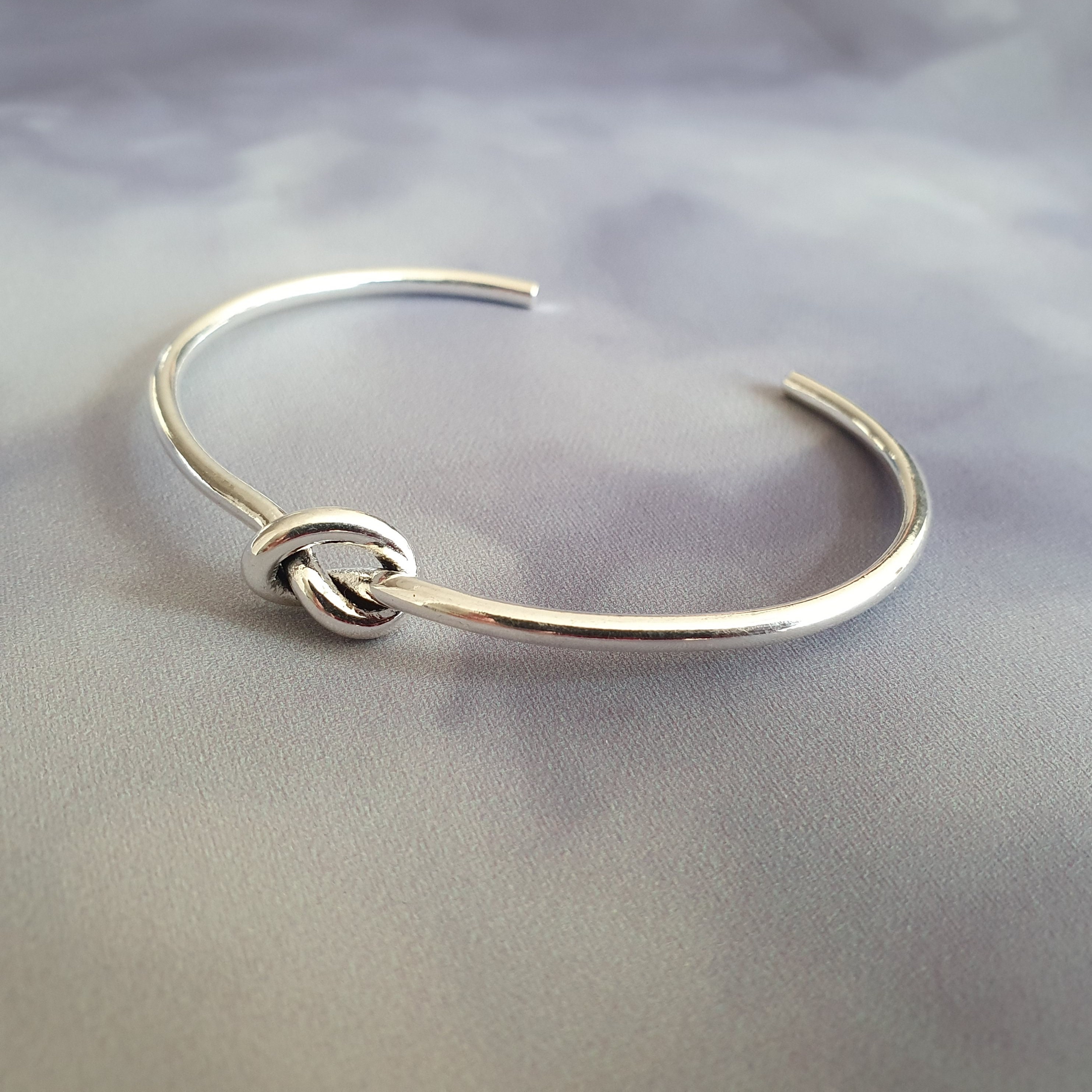Silver on sale knot bracelet