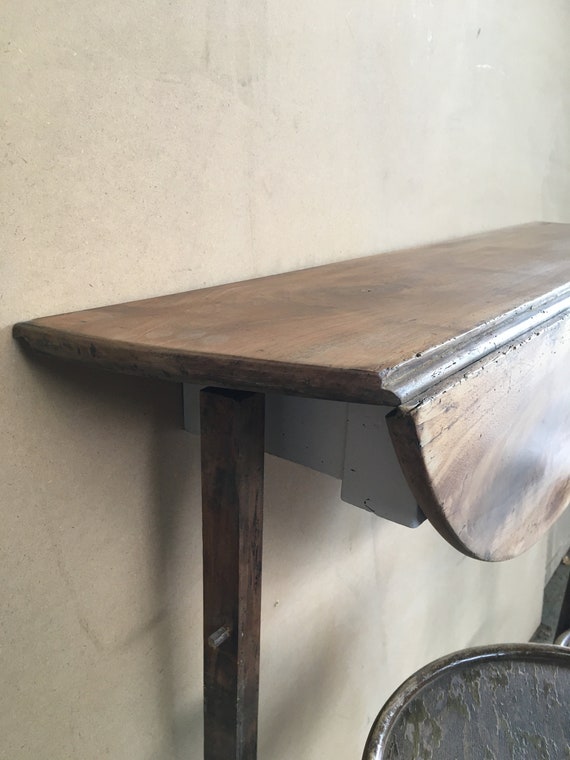 Half table 2024 against wall