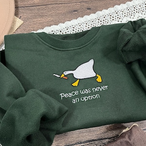 Murder Duck Embroidered Crewneck Sweatshirt,Untitled Duck Game,Duck with Knife Meme,Funny Sweatshirt,Gifts for friends,Gift for her image 1