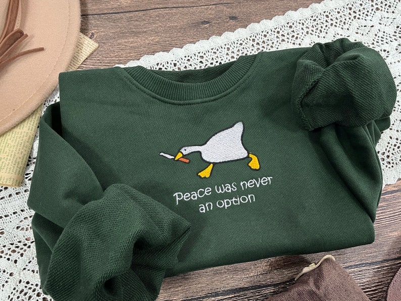 Murder Duck Embroidered Crewneck Sweatshirt,Untitled Duck Game,Duck with Knife Meme,Funny Sweatshirt,Gifts for friends,Gift for her image 1