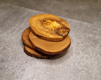 rustic coasters in a set of 4 made of olive wood approx. 10 cm Ø