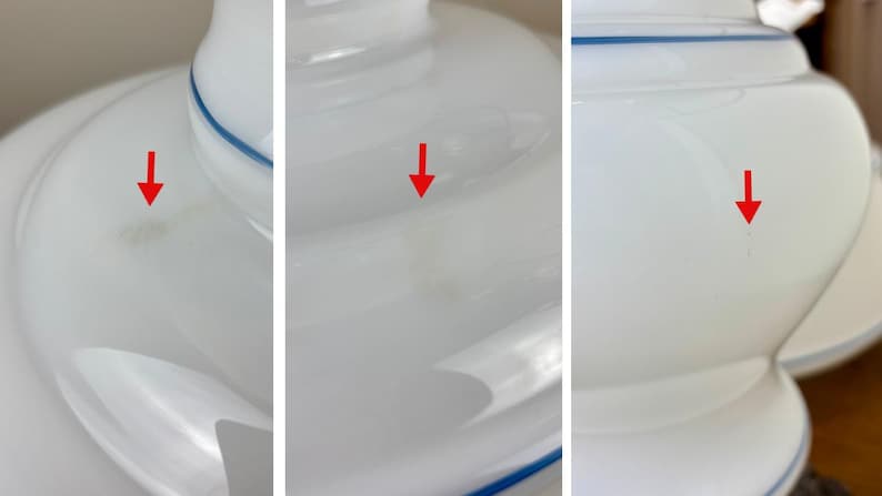 May include: White ceramic lampshade with a blue trim. The lampshade has three visible imperfections.