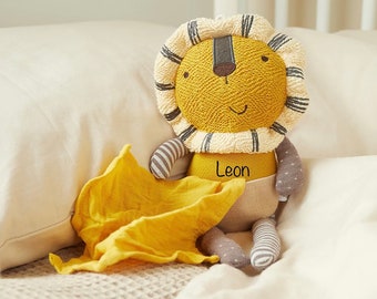 Cuddly toy lion personalized with name, dates of birth