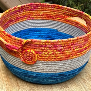 Orange and Blue Crock Handle Basket