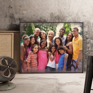May include: A watercolor painting of a large family group portrait. The family is standing together in a park setting, smiling and looking at the camera. The painting is done in a realistic style, with soft colors and brushstrokes.