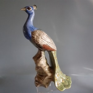 Peacock figurine made of porcelain, hand-painted