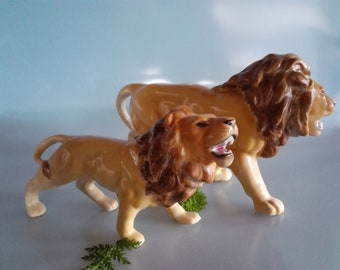 Porcelain lion figures, hand-painted