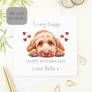 May include: A Father's Day card featuring a cartoon illustration of a brown dog with the text "To my Daddy" and "Happy Father's Day" with a signature that reads "Love Bella x".
