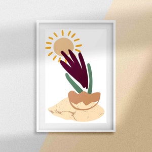 May include: A framed print with a minimalist abstract design featuring a stylized sun, a purple flower, and green leaves on a beige background.