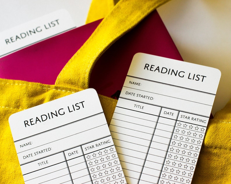 Two paper bookmarks that say Reading List and have room for the reader's name, the date and the titles of the books they've read, plus a review out of 5-stars.