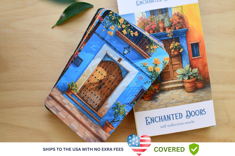 May include: A deck of "Enchanted Doors" self-reflection oracle cards. The cards feature a blue door with a wooden door and a colourful building. The card deck is next to a book with the same image. The text "Enchanted Doors" is visible.