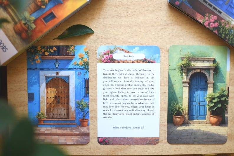 May include: Oracle cards with illustrations of doors and buildings, including one with the text "True Love". The cards are displayed on a wooden surface. The images evoke themes of guidance and self-reflection, with a focus on love.