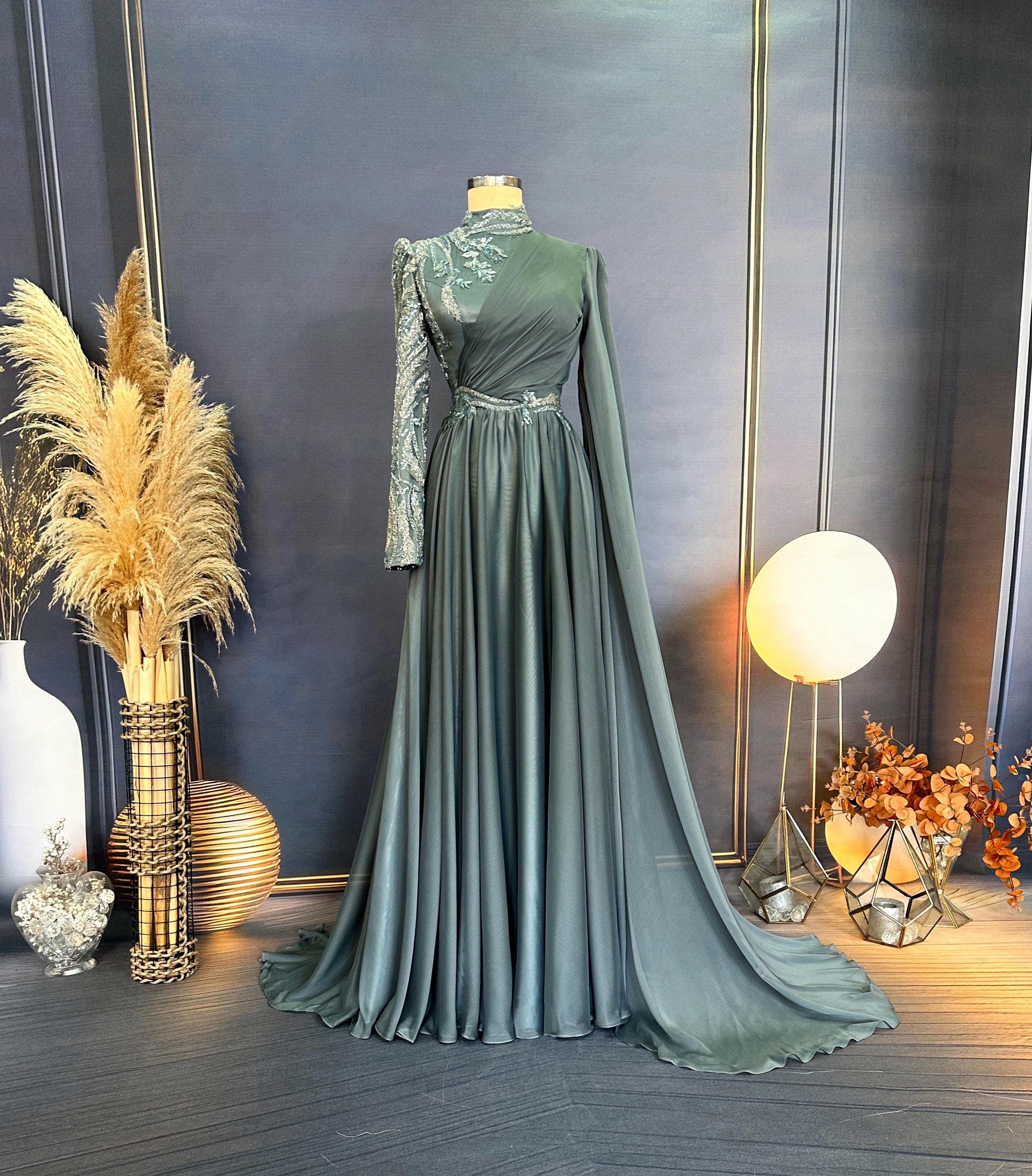 evening dress muslimah The dress for your next occasion, very simple but so flattering. Comes in Black and White #fashion #dress#dresses #ootd #modest #muslimah #blackdress #longdress #maxidresses #fyp #eveningdress