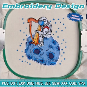 May include: An embroidery design showing an astronaut playing a harp on a blue planet with craters, encircled by stars. The design is within a green embroidery hoop. Text reads "Embroidery Design" and "Instant Download".