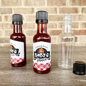 Mini 50ml bottles with personalized Baby-Q labels featuring flame and grill design and gingham pattern