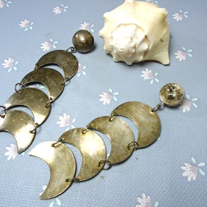 May include: A set of three ceramic mugs with a speckled, matte finish. The mugs are in shades of cream, light gray, and dark gray. Each mug has a simple, minimalist design, perfect for coffee or tea.