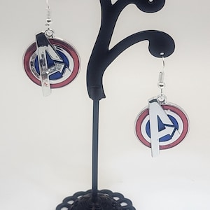Superhero dangle earrings