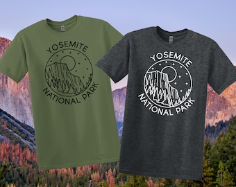 May include: Two short-sleeved t-shirts, one olive green and one charcoal grey, each with a circular graphic. The graphic includes the text "YOSEMITE NATIONAL PARK" around a mountain and tree design.
