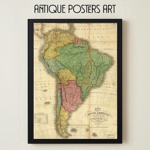 Może przedstawiać: Biały ceramiczny kubek z czarnym uchwytem i napisem "But First, Coffee" czarną, odręczną czcionką. Kubek stoi na białej powierzchni.