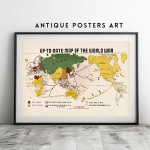 May include: Framed vintage map titled "Up-To-Date Map of the World War." The map features countries in shades of yellow, green, and brown, with text labels and directional lines. The words "ANTIQUE POSTERS ART" are at the top.