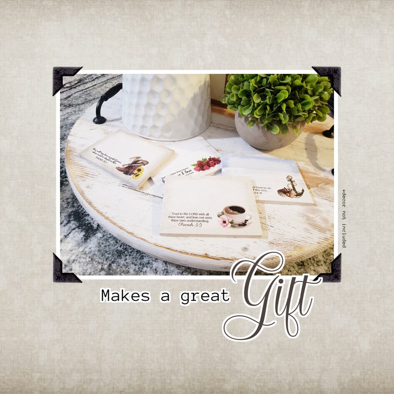 May include: Set of four square coasters with different designs. The coasters feature a variety of images, including a cowboy boot, a coffee cup, an anchor, and a floral design. The coasters are made of a light brown material and have a white background. The text on the coasters reads "Trust in the LORD with all thine heart; and lean not unto thine own understanding." Proverbs 3:5.