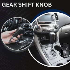 May include: A carbon fiber gear shift knob with a metallic base, shown installed in a vehicle center console and held in a hand. The product is also displayed in a black box labeled SHIFT N PREMIUM SHIFT KNOB. The text GEAR SHIFT KNOB is visible.