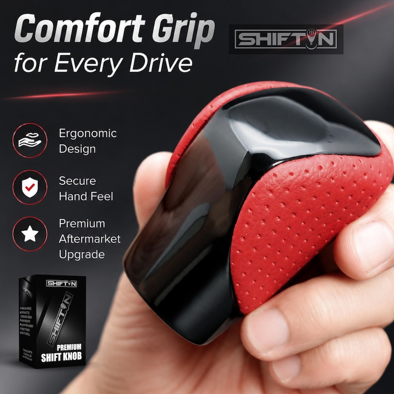 May include: A gear shift knob featuring a glossy black top section and a textured red perforated leather-like side grip. The image includes text: Comfort Grip for Every Drive, SHIFTN, Ergonomic Design, Secure Hand Feel, Premium Aftermarket Upgrade.