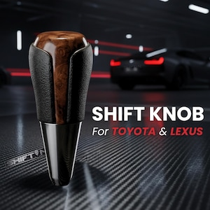 May include: A gear shift knob featuring a polished brown wood grain top, textured black leather sides, and a smooth black base. The text SHIFT KNOB For TOYOTA & LEXUS is displayed in white and red lettering next to the product.