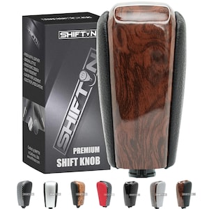 May include: A premium shift knob with a wood grain finish and black leather accents. The product is displayed with its packaging, which includes the brand name "SHIFTIN" and product details. Several alternative shift knob designs are shown below the main product.
