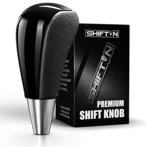 May include: A black gear shift knob with a glossy top and textured sides, featuring a silver metallic base. It is displayed next to a black rectangular box labeled SHIFTIN PREMIUM SHIFT KNOB with white text and a logo featuring a gear shift icon.