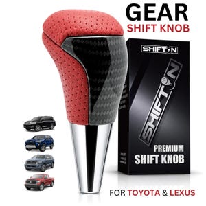 May include: A red perforated leather gear shift knob with black carbon fiber accents and a polished silver base. The product is displayed next to a black box labeled SHIFTN PREMIUM SHIFT KNOB FOR TOYOTA & LEXUS, with four small images of vehicles.