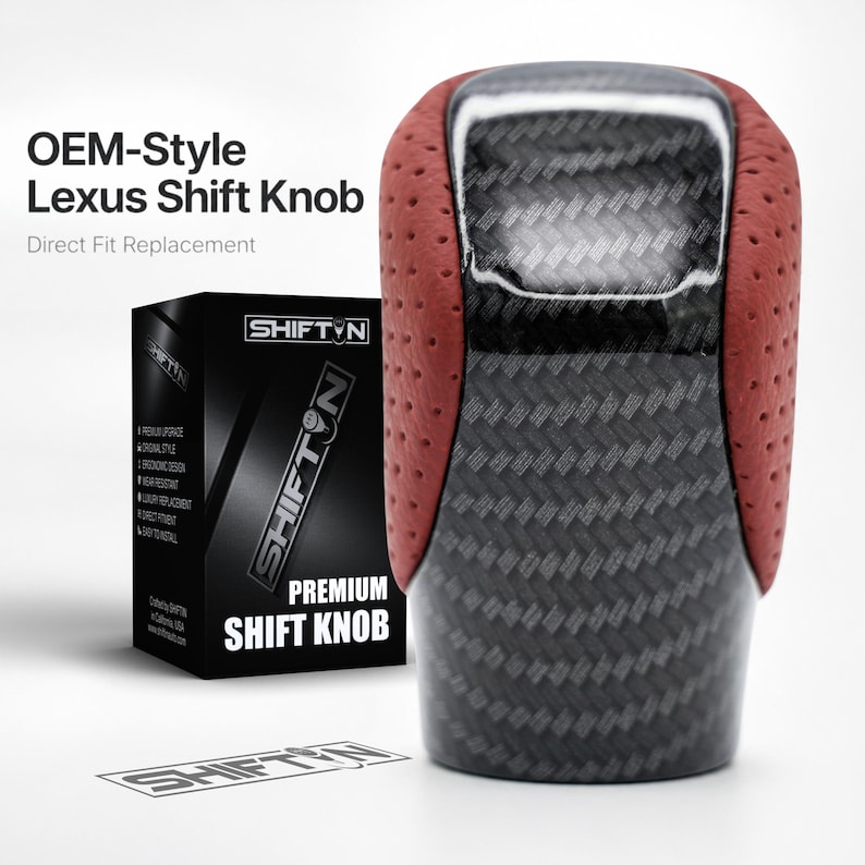 May include: A gear shift knob featuring a central carbon fibre pattern panel flanked by perforated red side sections. The product is displayed next to its black packaging box, which is labelled with the text SHIFTN PREMIUM SHIFT KNOB.