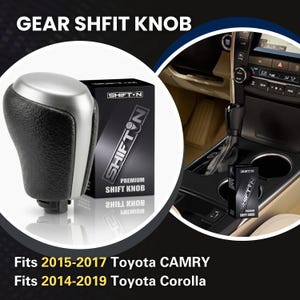 May include: A black and silver gear shift knob with a textured grip, accompanied by a black box labeled SHIFTN PREMIUM SHIFT KNOB. The text GEAR SHIFT KNOB, Fits 2015-2017 Toyota CAMRY, and Fits 2014-2019 Toyota Corolla is visible on the image.