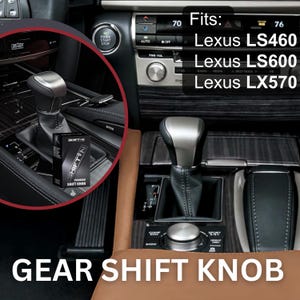 May include: A silver and black gear shift knob with a leather boot installed in a vehicle center console. Text on the image reads: Fits: Lexus LS460, Lexus LS600, Lexus LX570, SHIFT-N PREMIUM SHIFT KNOB, and GEAR SHIFT KNOB. The console features wood trim.
