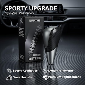 May include: A premium SHIFTYN shift knob with a carbon fiber design and a silver base. The product is displayed next to its black box, which has the text "SPORTY UPGRADE" and "Style Meets Performance". The box also has the text "PREMIUM SHIFT KNOB".
