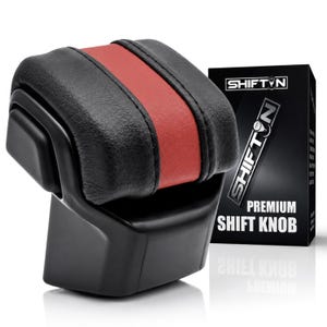 May include: A black and red leather-textured gear shift knob with a black plastic base. Next to it is a black box with the text SHIFTN and PREMIUM SHIFT KNOB printed in white, featuring a graphic of a gear shift knob with a manual transmission pattern.